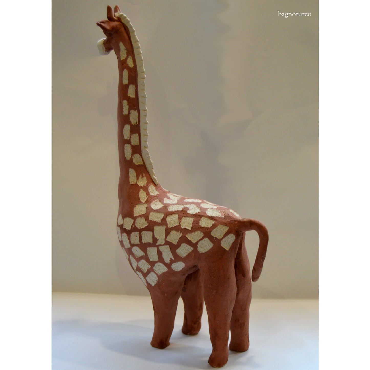 Giraffe terracotta sculpture