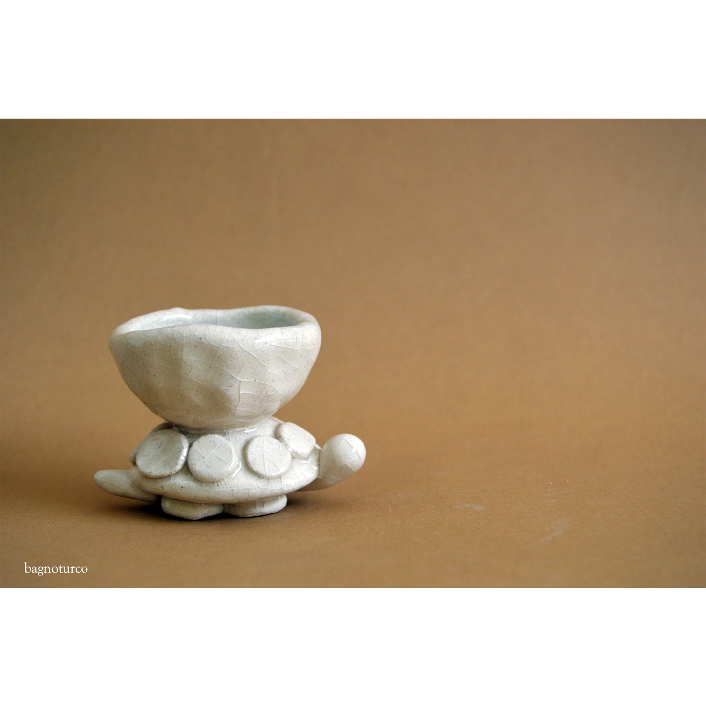 Ceramic turtle-shaped sculpture
