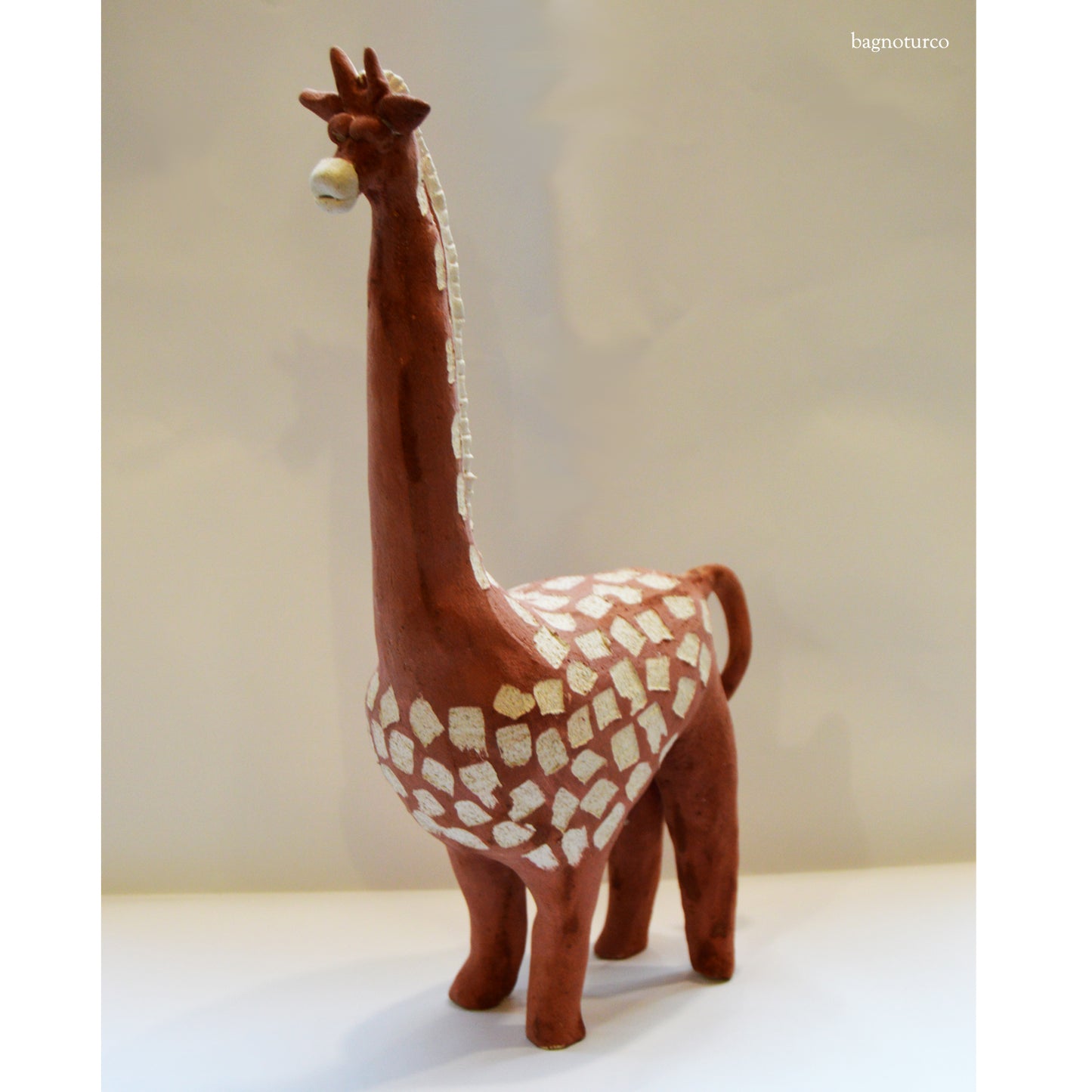 scultura in terracotta Giraffa